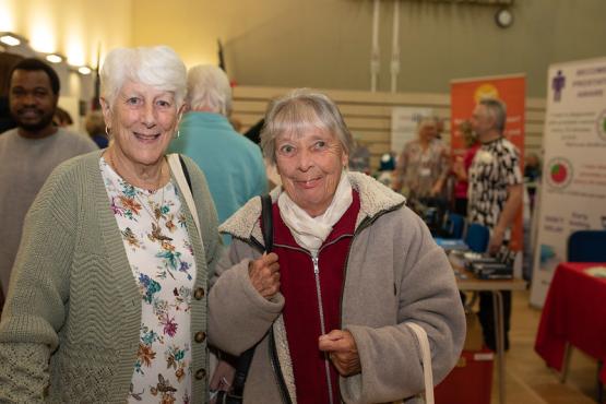 Two elderly women at an event